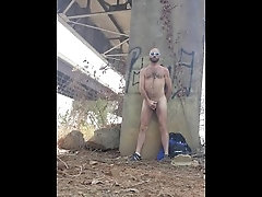 Fucking my ass with a big dildo under a busy overpass