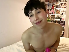 Handcuffed twink loves his pink toy